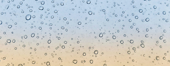 Water droplets on glass.