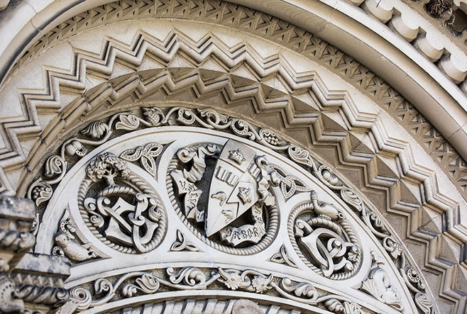 Photo of the stonework above the doors of University College