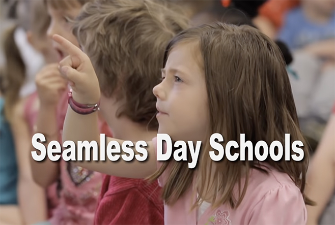 A child learning in a classroom. The text overlay says, "Seamless Day Schools".