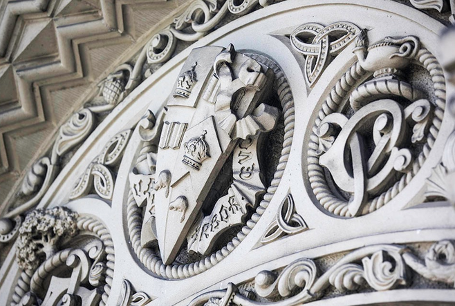 A close up of decorative facade at the University of Toronto