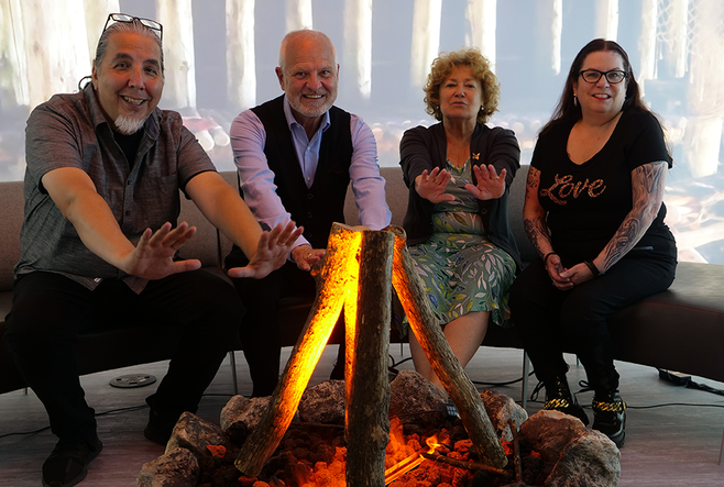 From left to right: Elder Clayton Shirt, Interim Dean Normand Labrie, Professor Clare Brett and Professor Sandra Styres sit in the new land-centred learning environment at OISE