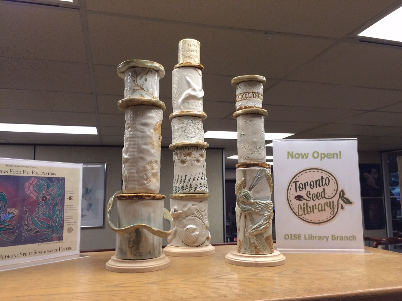 three clay towers in exhibition at OISE Library