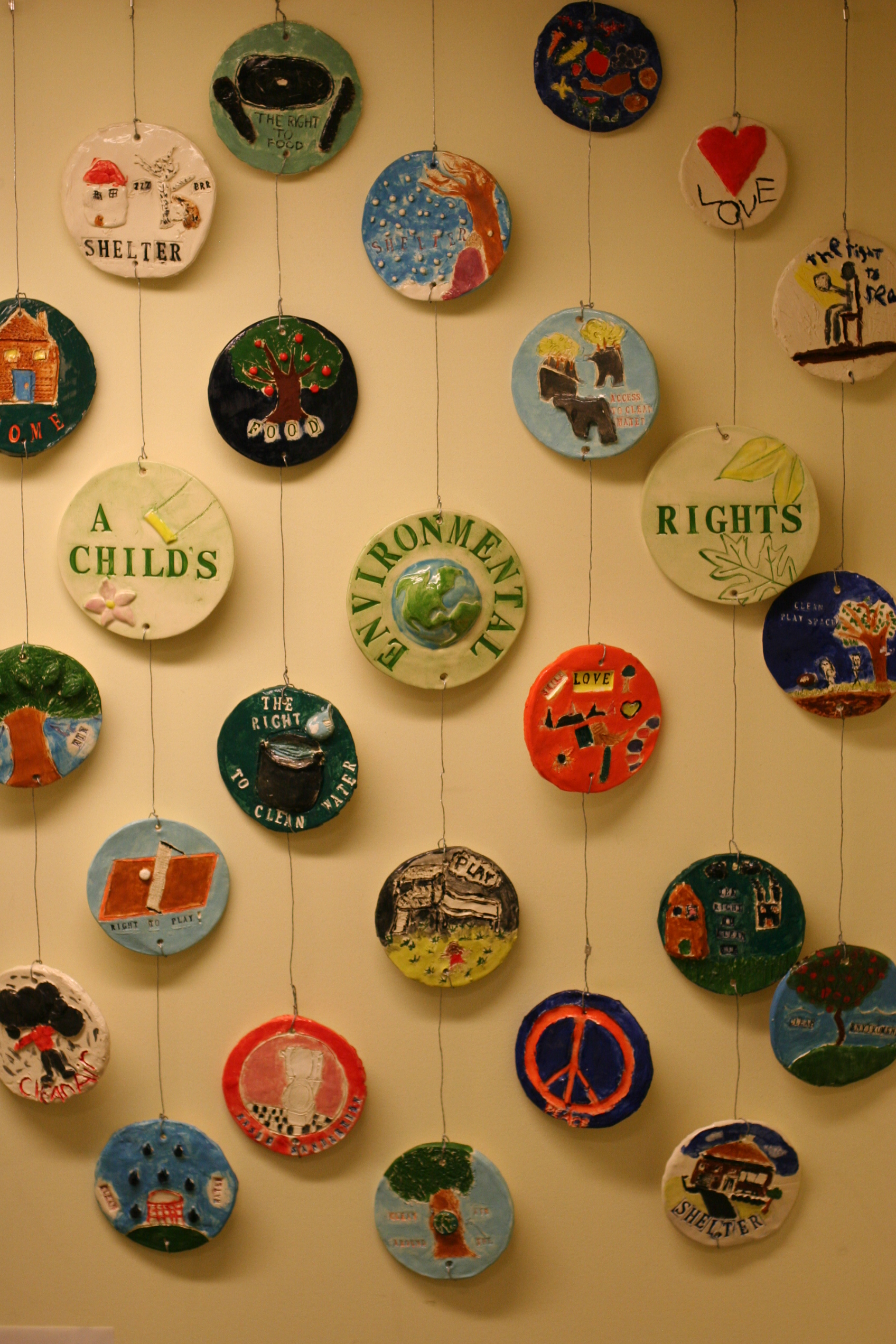 round tiles installation about environmental rights of the child