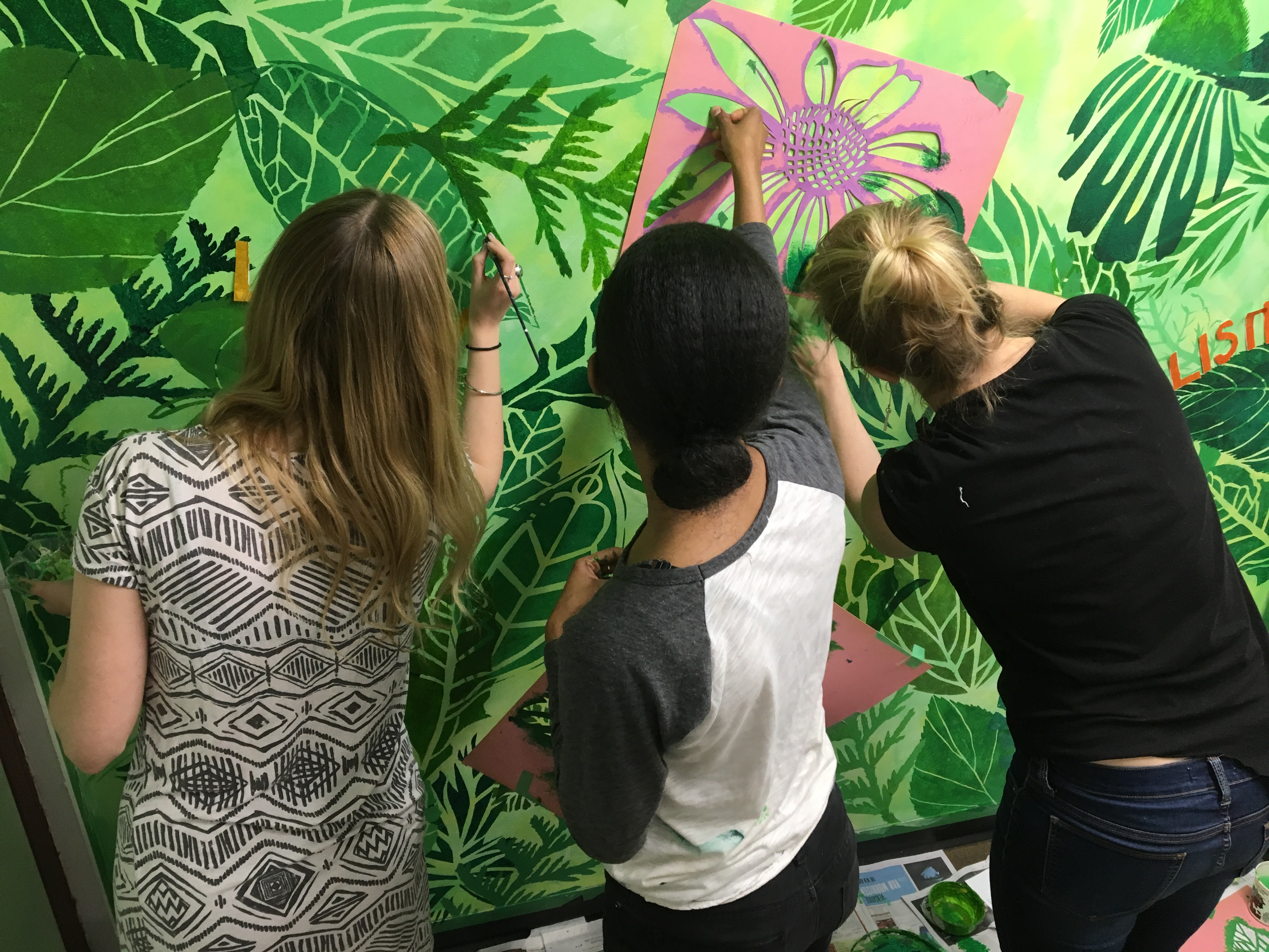 OISE students working on environmental mural