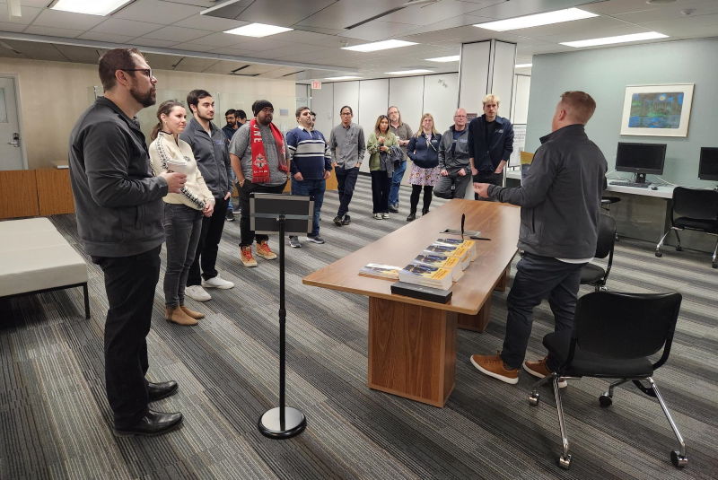 Education Commons comes together for Ryan Lahti's book signing on the third floor.