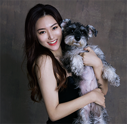 Image of Wenke Wang AECD MEd Alum with her dog