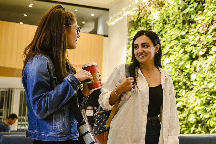 Two students at an OISE Orientation event.