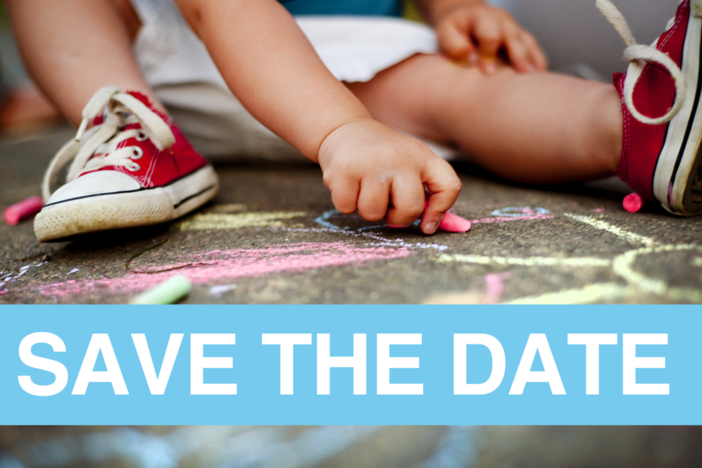 Child drawing with chalk on side walk - Save the Date banner across photo