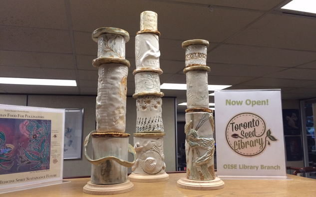 three clay towers in exhibition at OISE Library