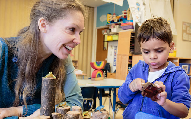 A student with a JICS Educator. 