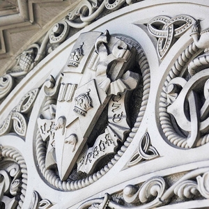 A close up of decorative facade at the University of Toronto