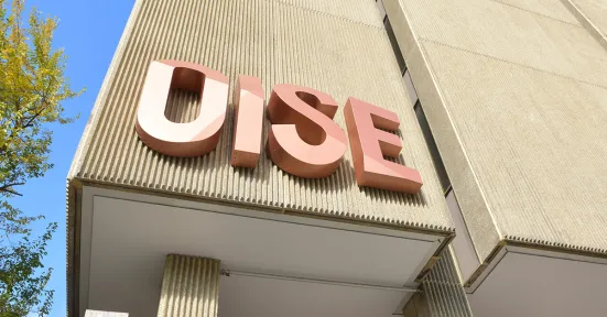 Outside signage of the OISE Building.