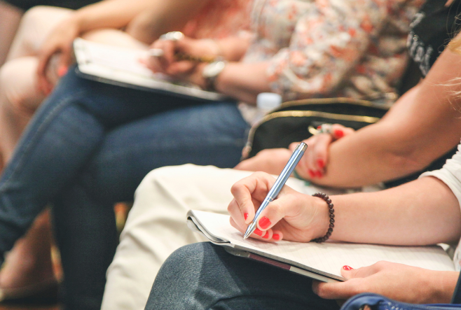 students taking notes in class